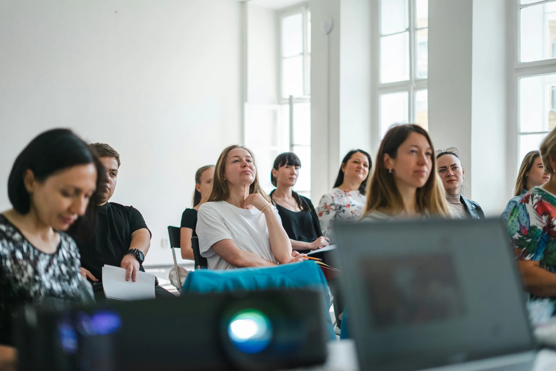 A group of people taking part in an in-person workshop